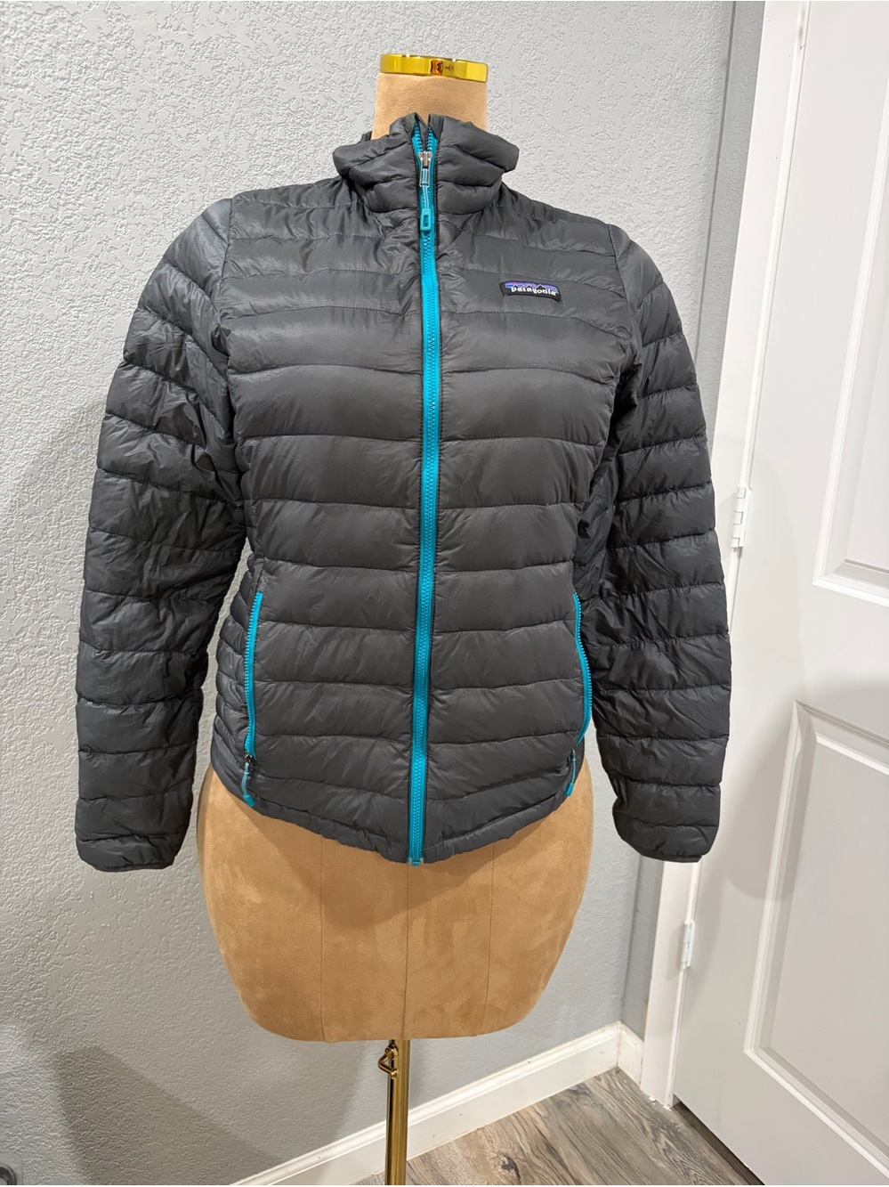 Patagonia Black Puffer Jacket with Teal Zippers